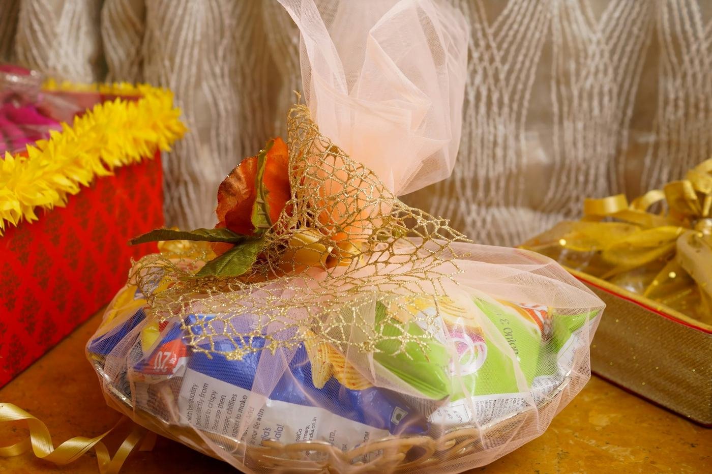A festive gift hamper with treats and flowers